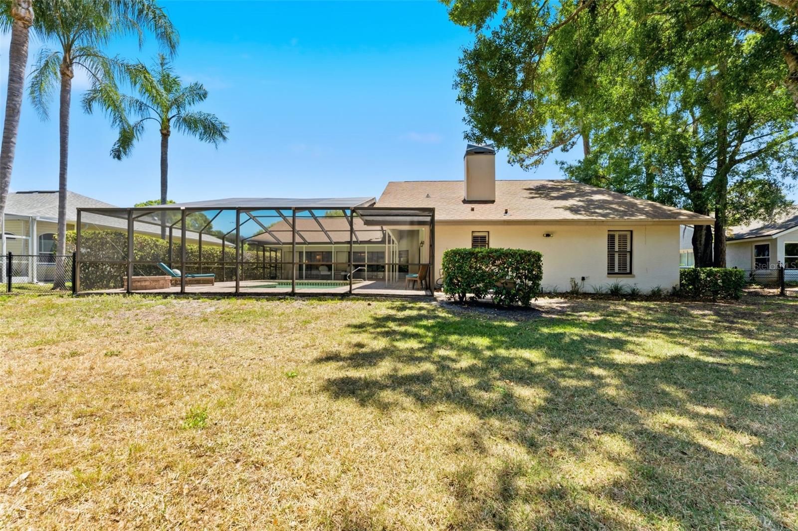 Spacious Backyard with Mature Trees