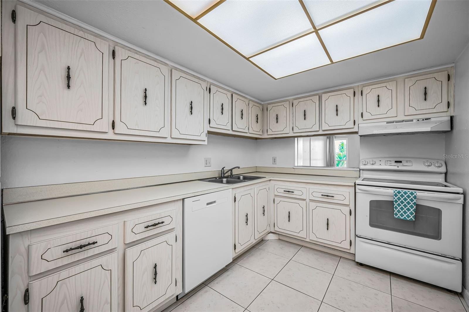 The Kitchen offers an abundance of cabinets, a new dishwasher, and newer fridge.