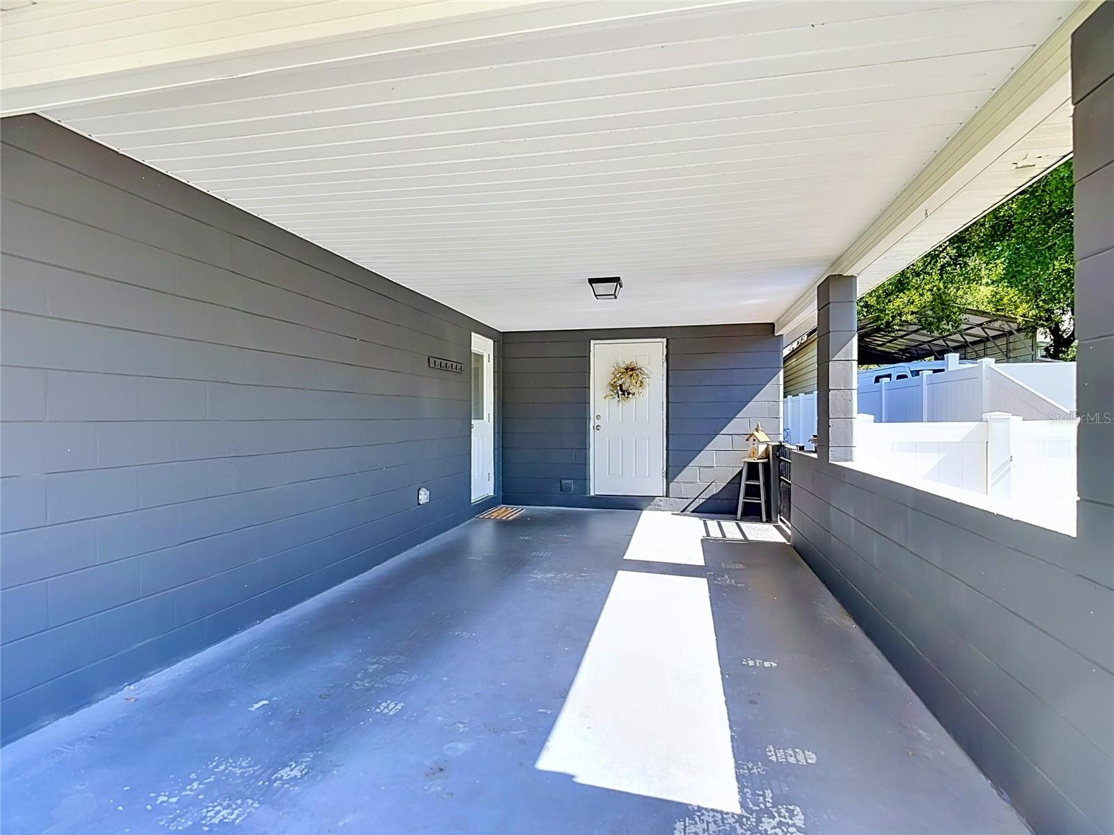 Covered CarPort with Storage Room
