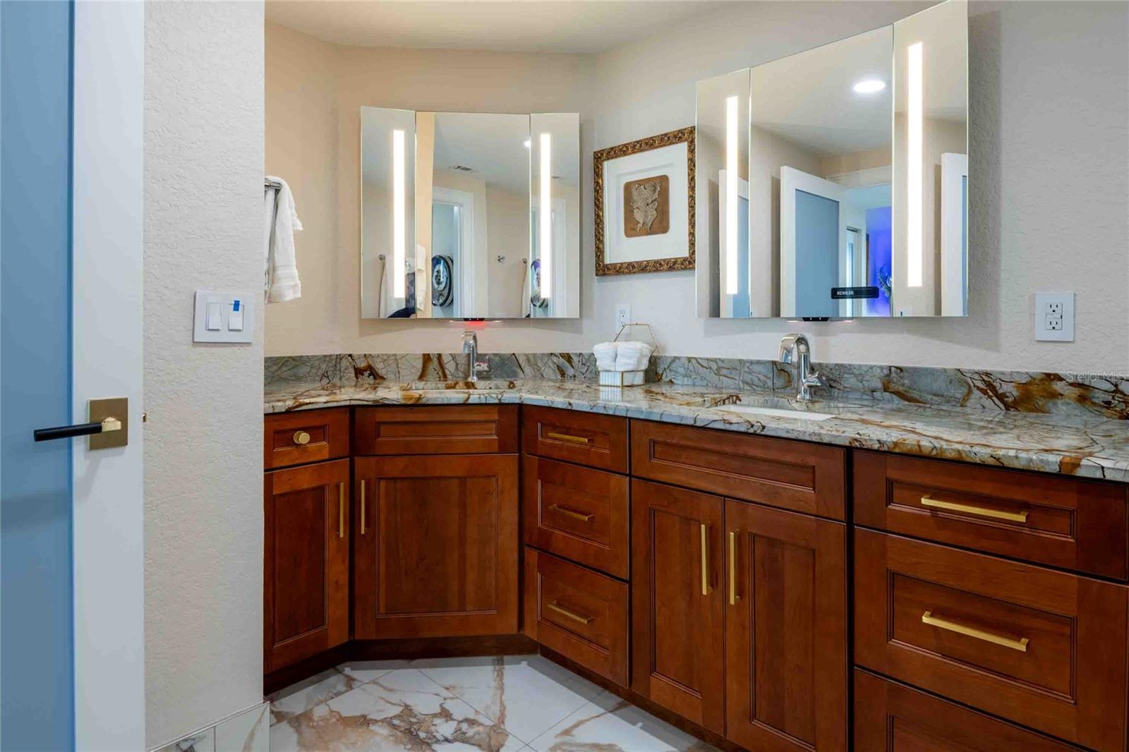 Master Bathroom with his and her sinks and plenty of storage