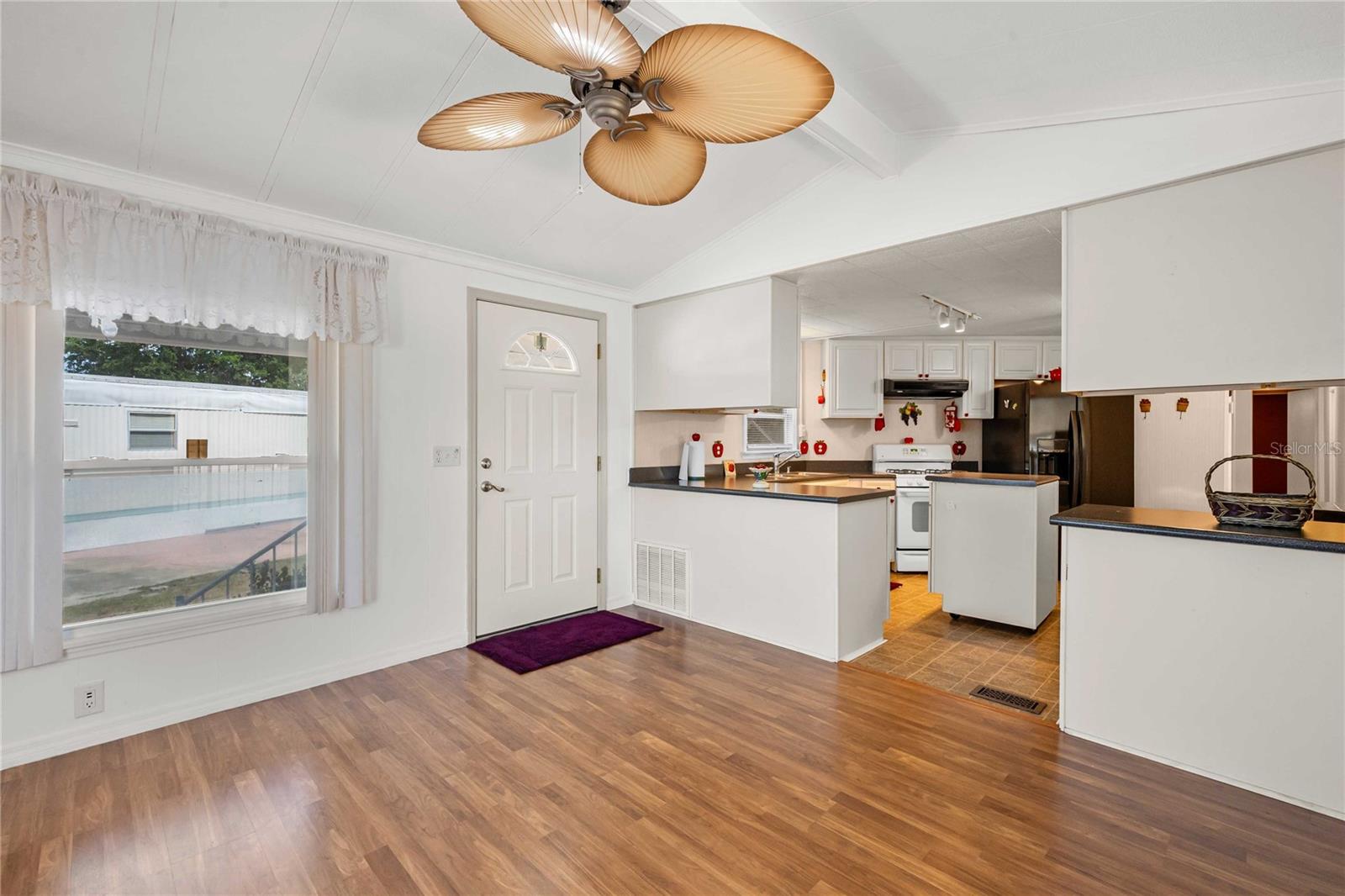 Open concept living room and kitchen.