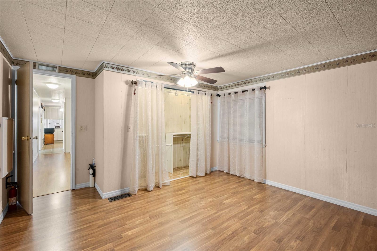 Ceiling fan and laminate flooring.