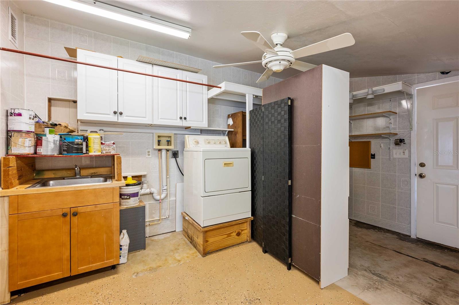Laundry area is off Florida room.