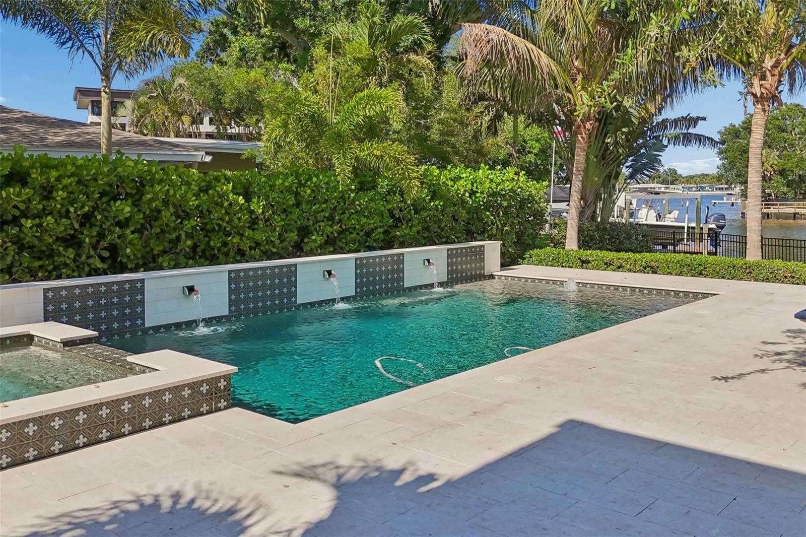 Pool with sundeck and fountains