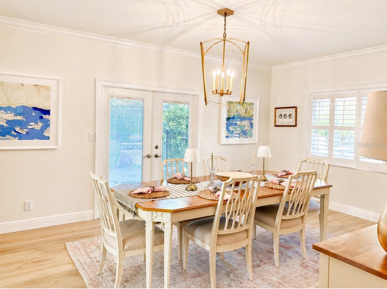 Formal dining room opens to outdoor kitchen patio