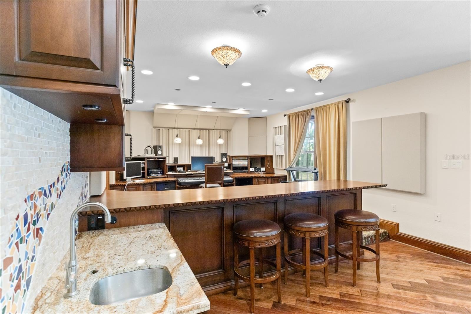 Enjoy a longer, expansive view of the recording area, it's a space that inspires both work and play.