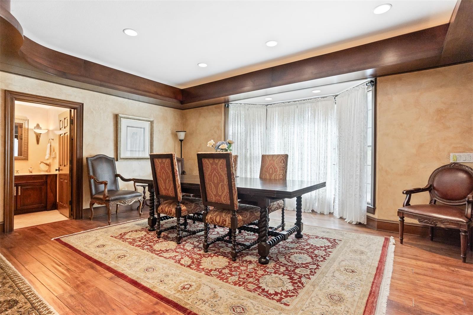 A look into the customized powder  room from the dining area