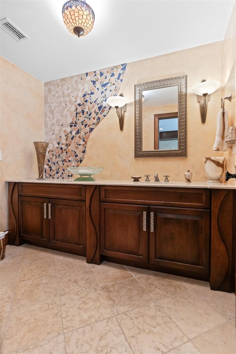 Look at all the details in this gorgeous powder room!