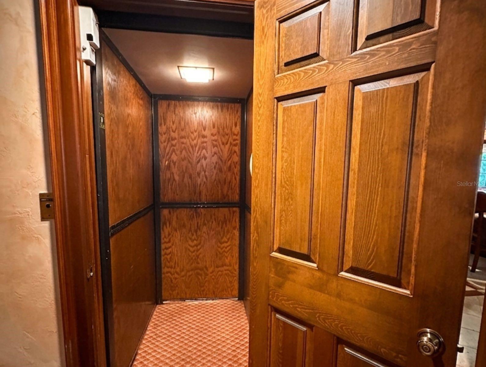 From the dining room the in home elevator brings you to all three floors.
