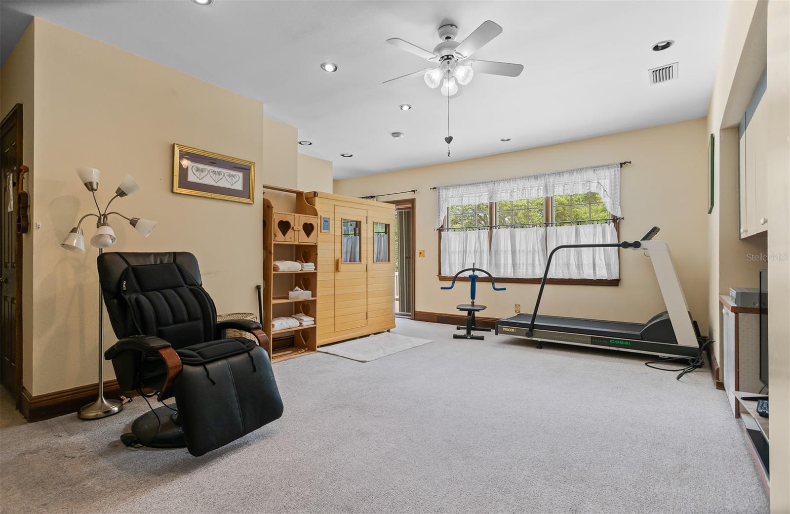 Exercise Room With Infrared Sauna and access to Balcony overlooking the Pool