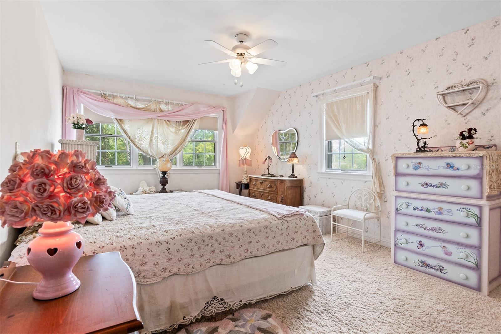 At the opposite end of the hallway is another spacious Bedroom
