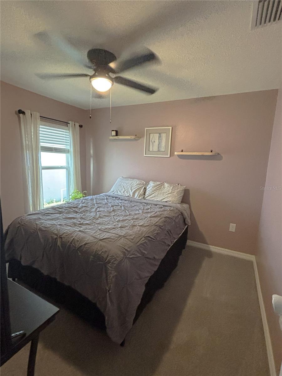 Guest Room that fits a Queen Bed Comfortably