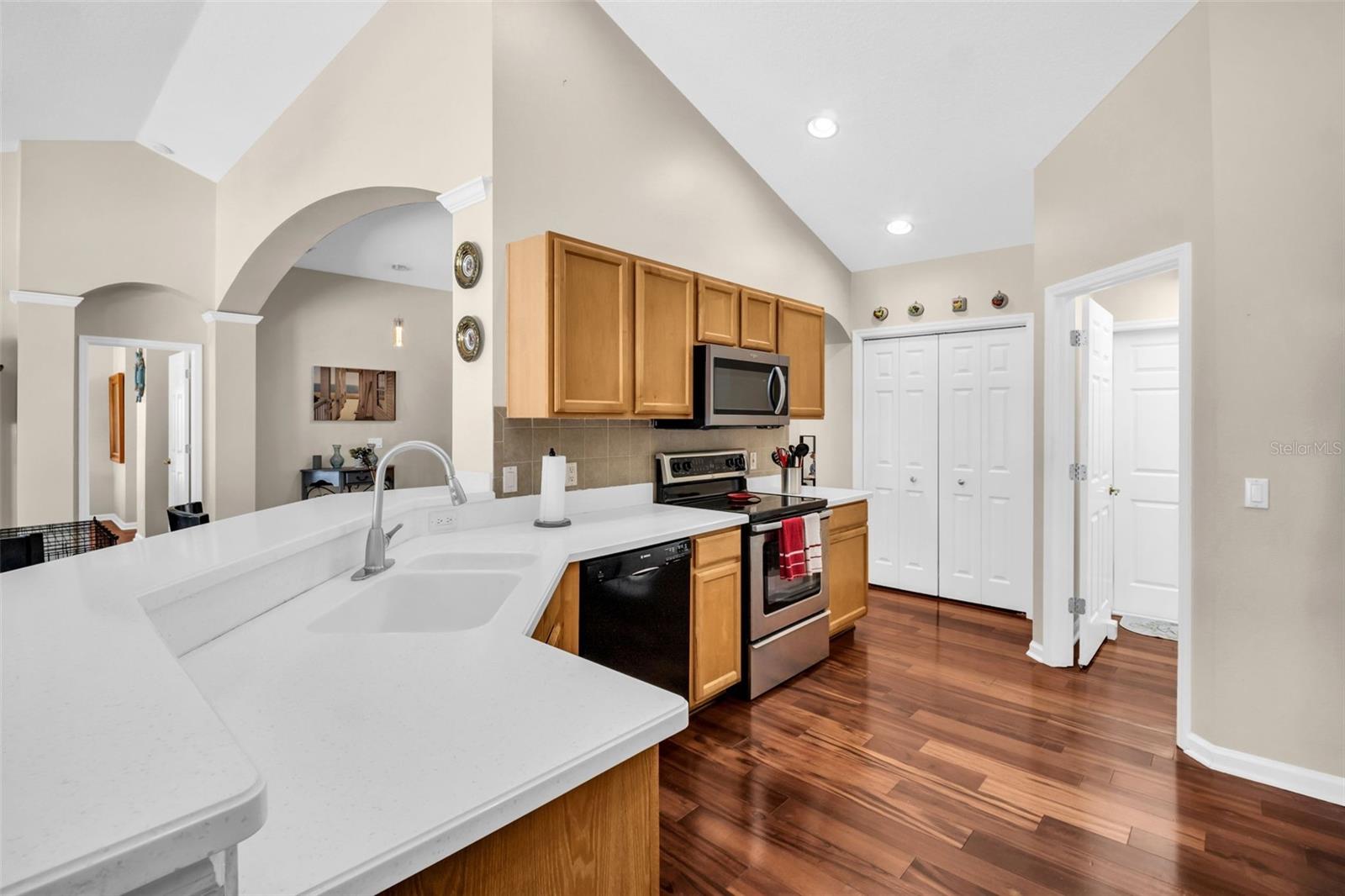 Beautiful Corian countertops & maple cabinets~