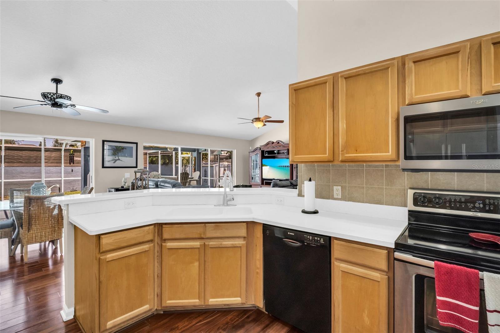 Direct pool views from kitchen & open living making entertaining a breeze~