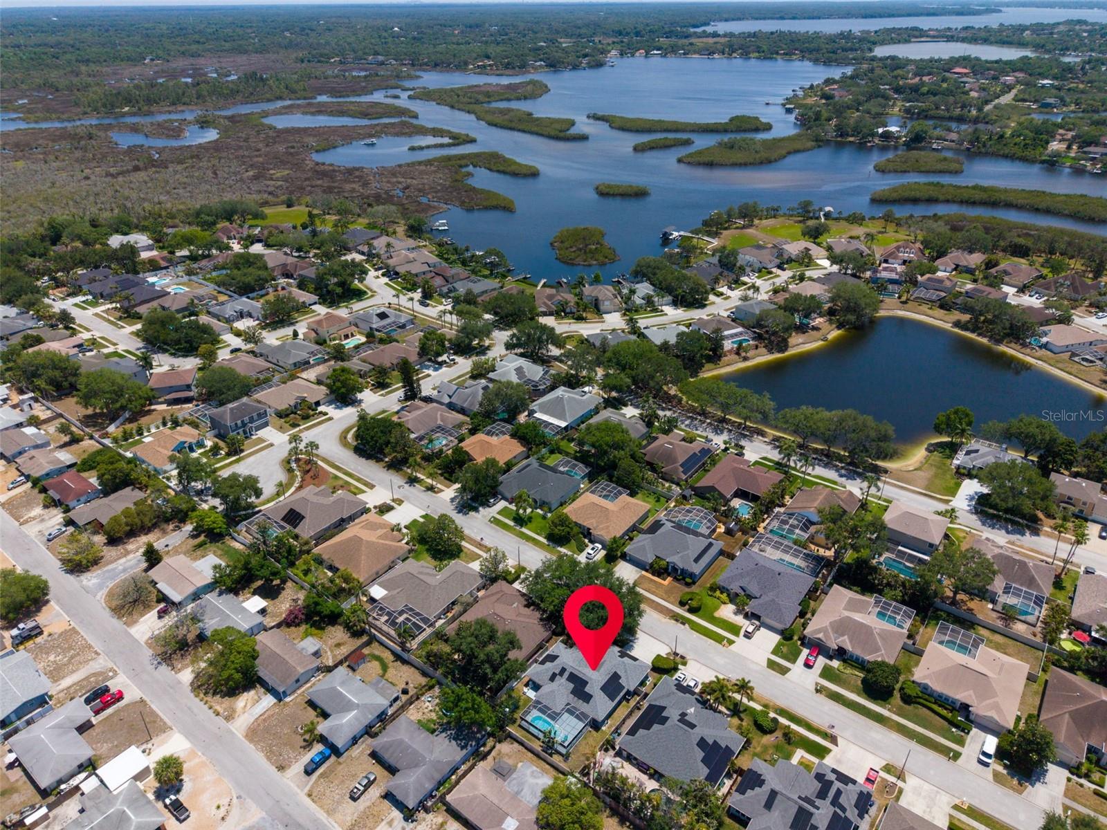 High & dry in NON-flood zone but with direct water access to the Anclote River for Gulf access~