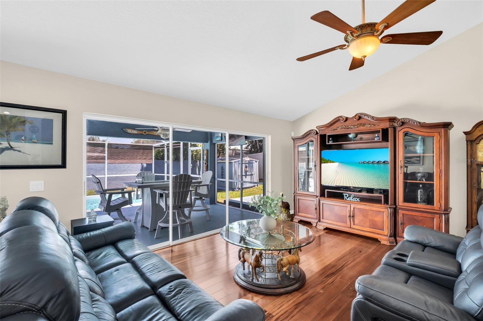 Stunning Brazilian cherry hardwood flooring flows throughout~