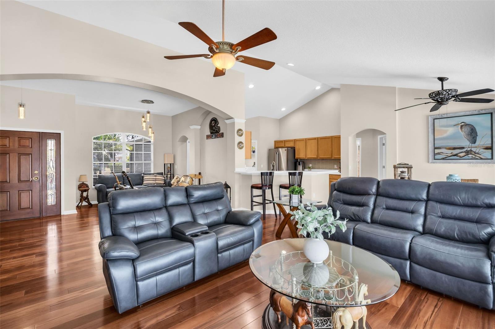Soaring vaulted ceilings & open main living~