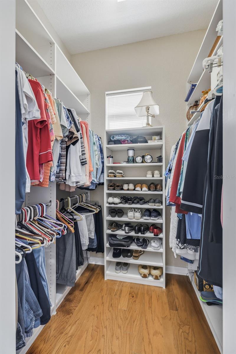 1 of 2 closets in primary bedroom