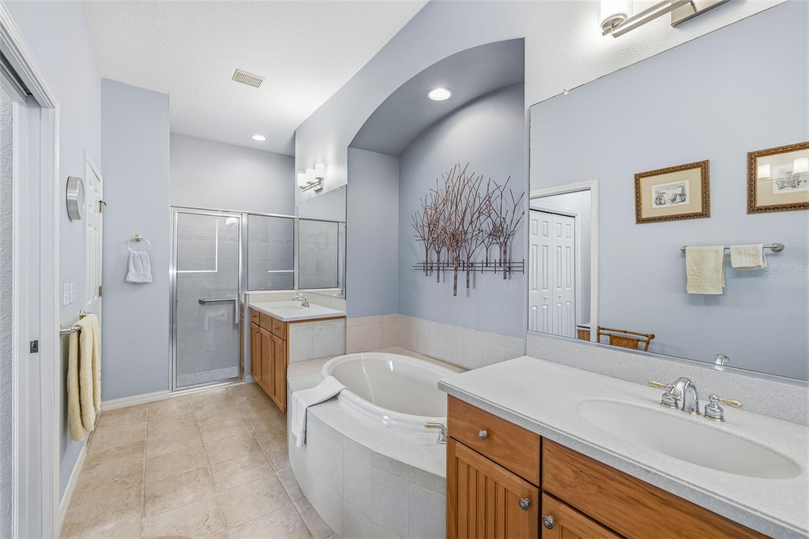2 vanities, soaker tub, walk-in shower and private water closet