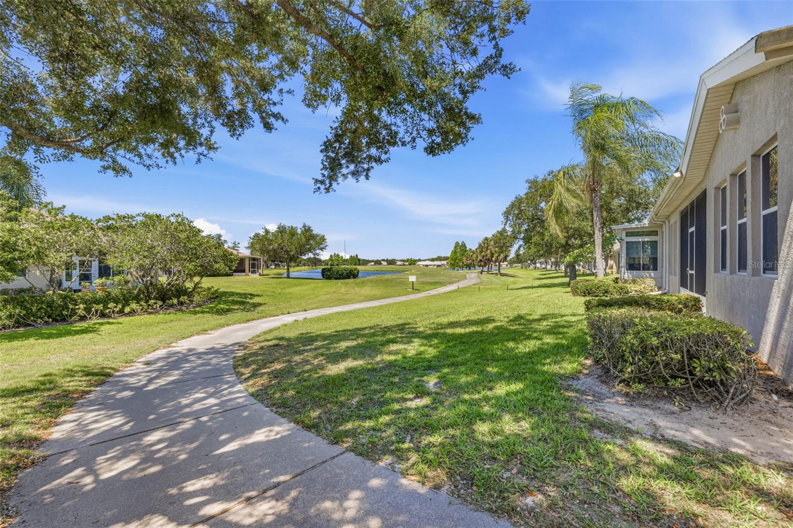 Golf cart path behind home