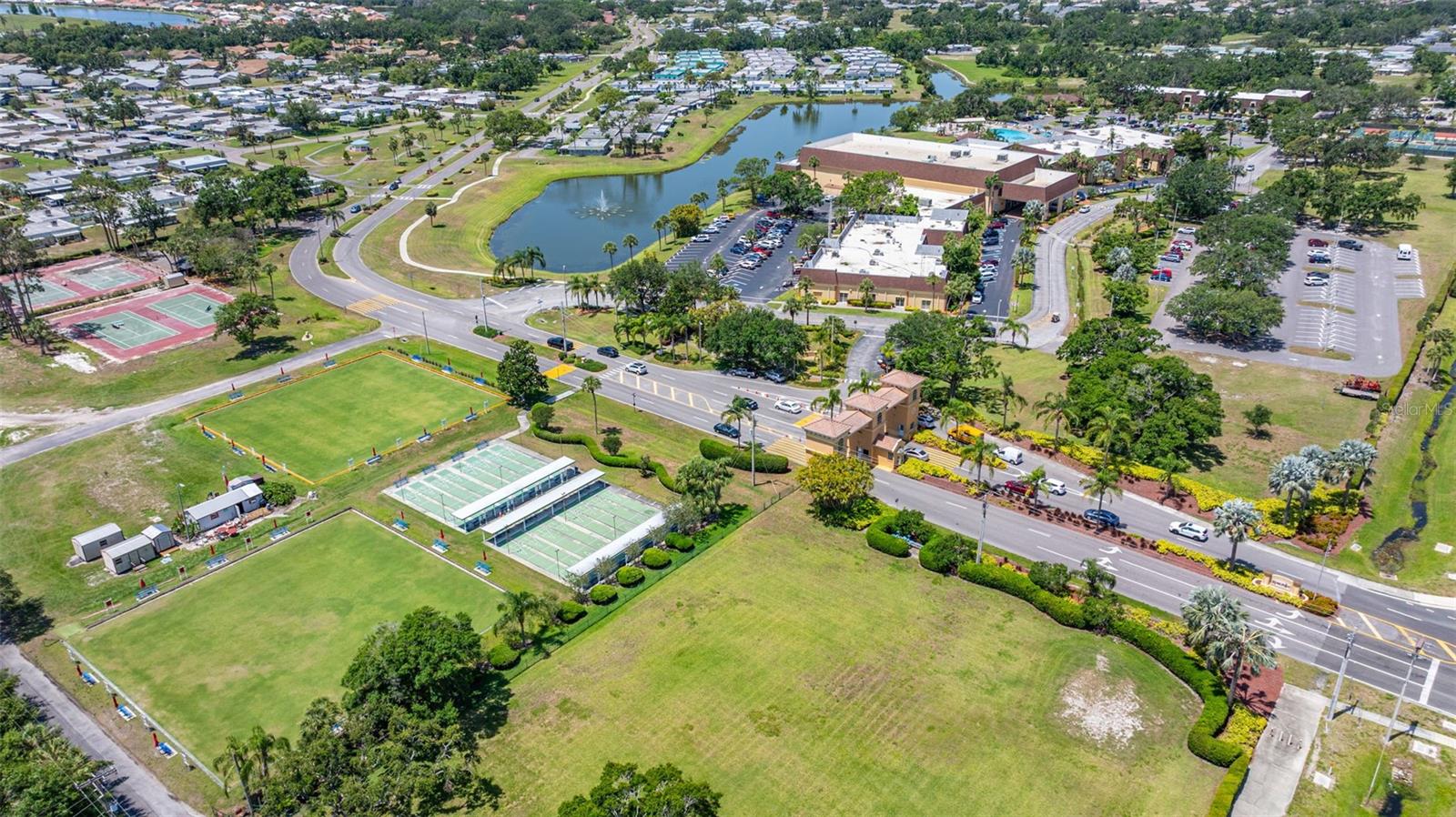 Main entrance with clubhouse and sports activity center