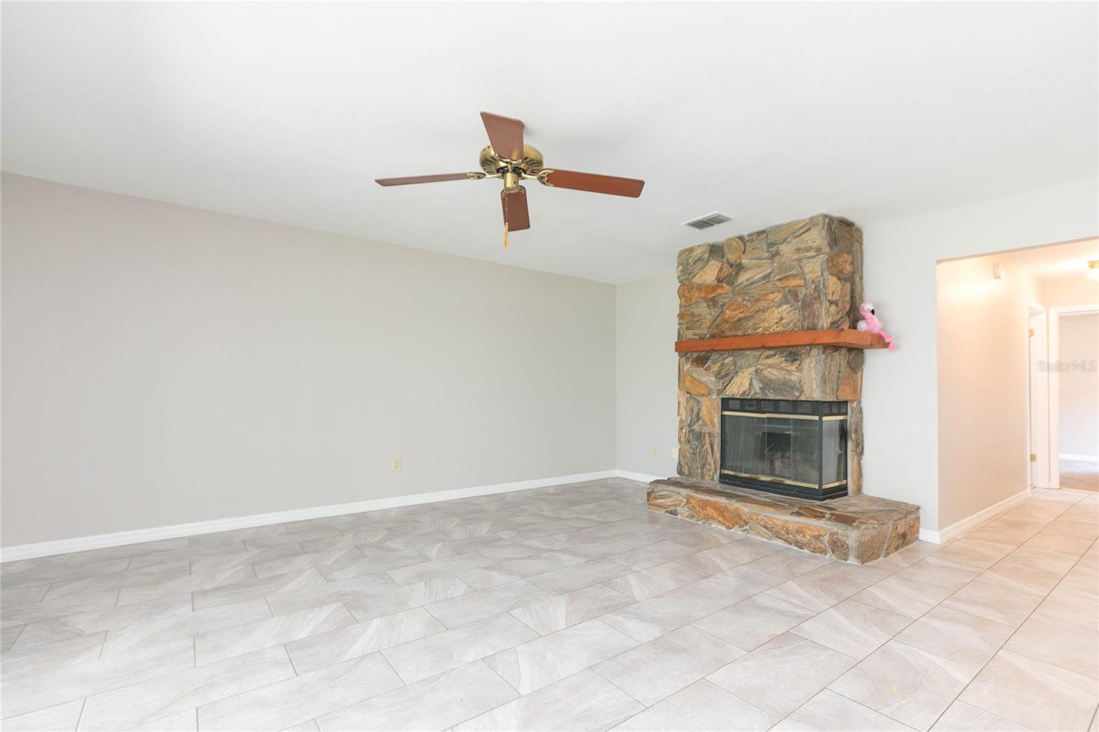 Family room with cozy fireplace and mantle (even Flow-rita loves the view!)