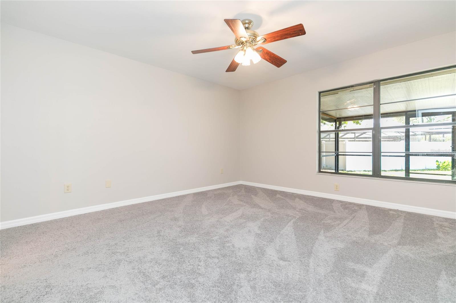 Primary bedroom with brand new carpet