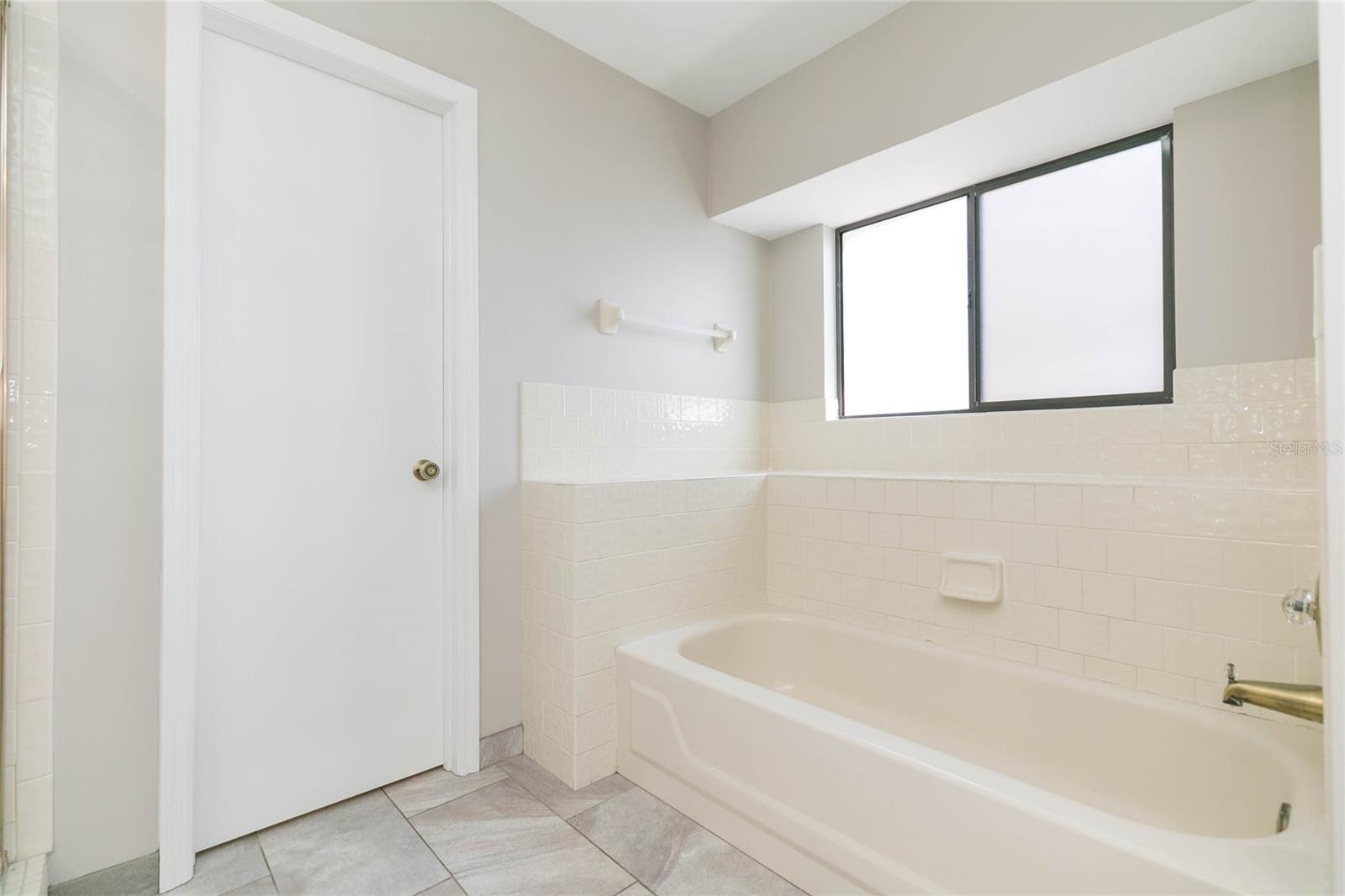 Primary bath soaking tub
