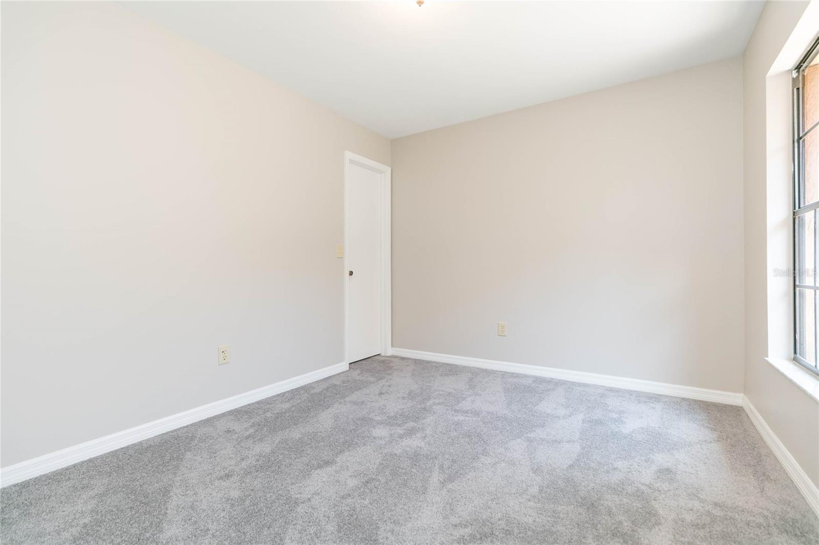 Guest bedroom #2 with brand new carpet