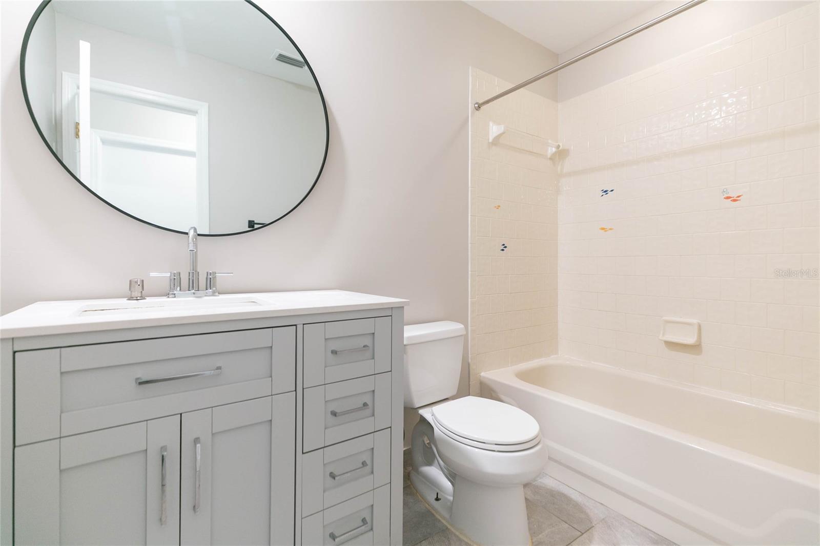 Renovated bath with tub