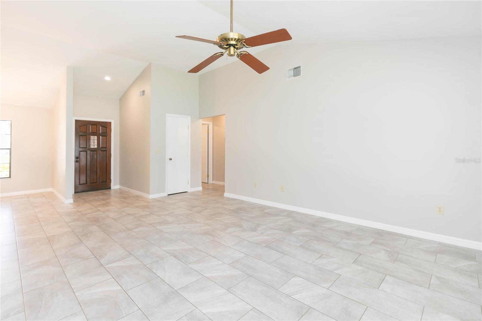 Entry with primary bedroom on the left as you walk in the front door
