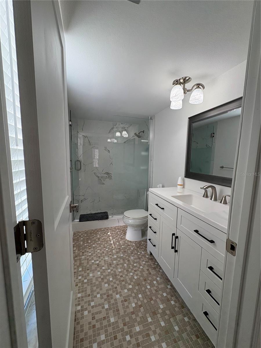 Updated bathroom with walk in shower