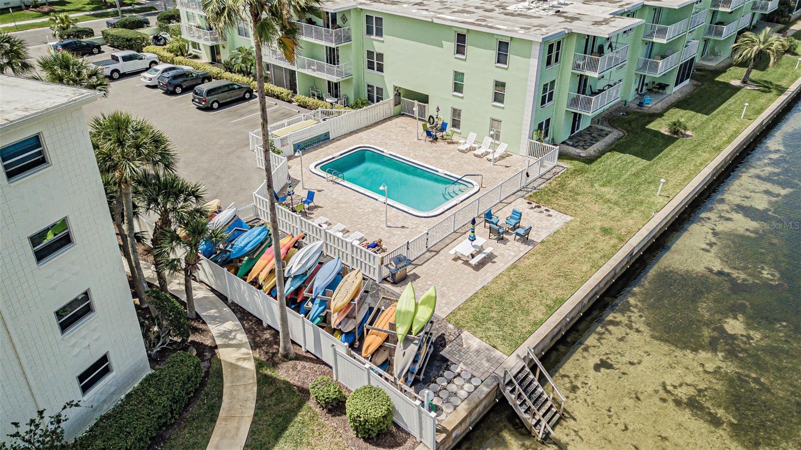 Poolside Kayak storage racks and BBQ grill