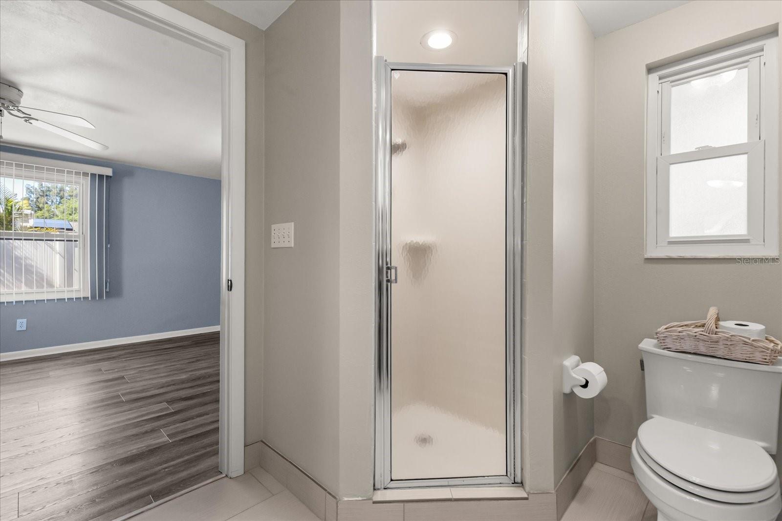 PRIMARY BATH WITH CORNER WALK-IN SHOWER