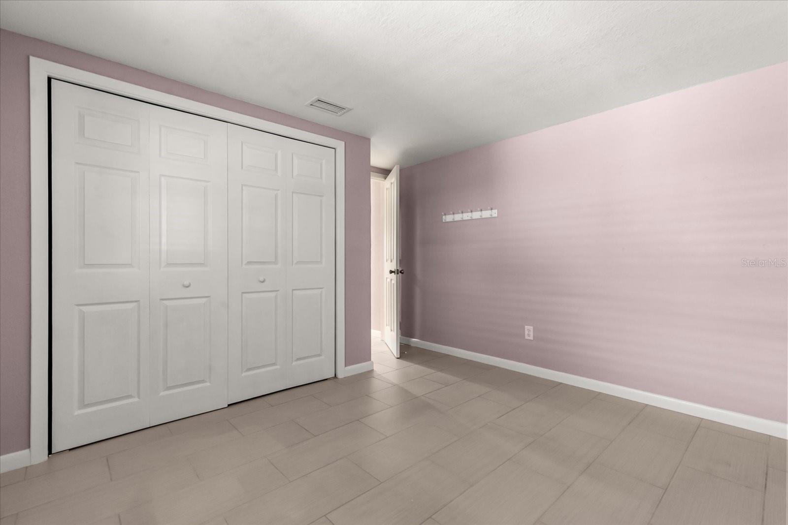 BEDROOM 2 WITH NEW BIFOLD CLOSET DOORS