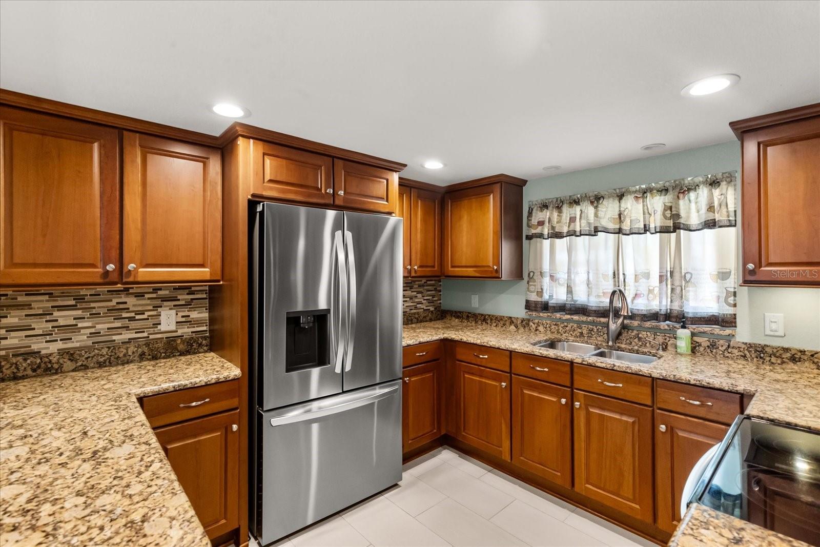 KITCHEN WITH 2024 LG REFRIGERATOR