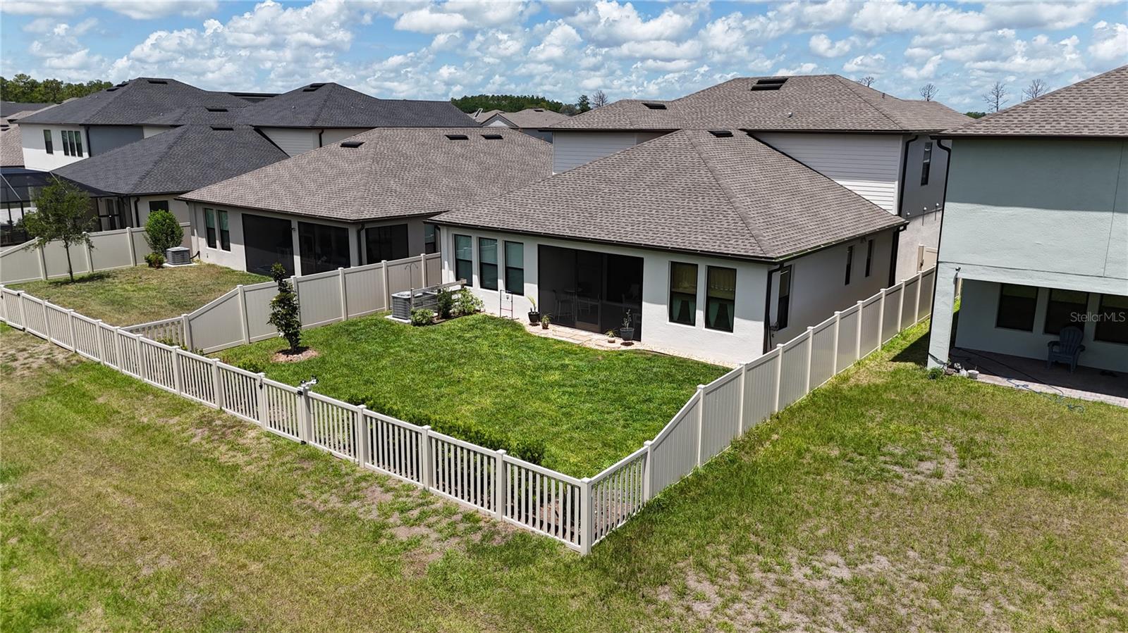 Backyard - fenced with sprinklers and landscaping