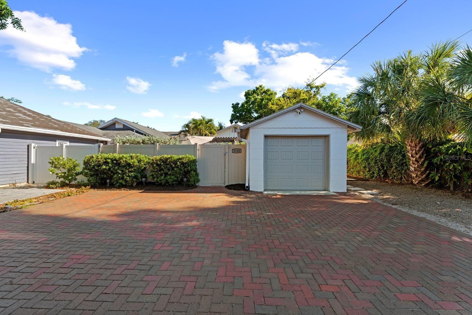 Garage alley access and parking pad