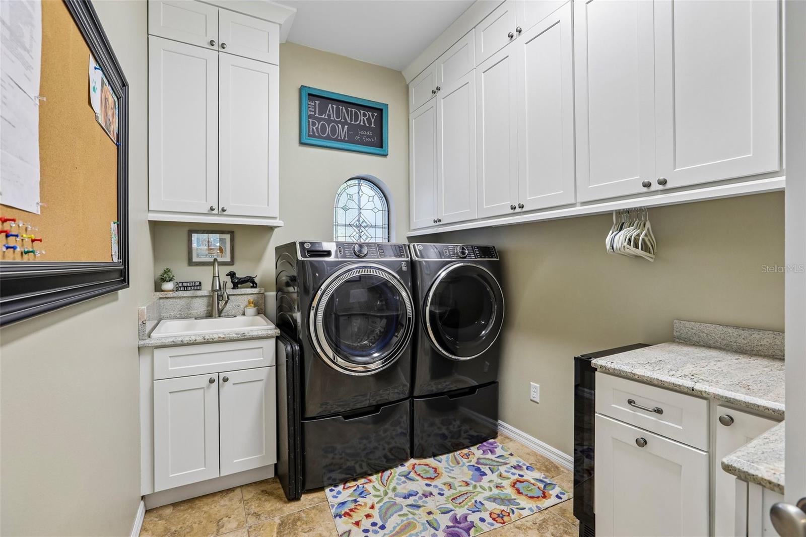 Inside Utility with Cabinets Galore