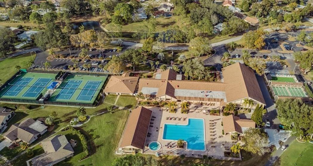 VIEW OF COMMUNITY CLUBHOUSE, POOL AND TENNIS