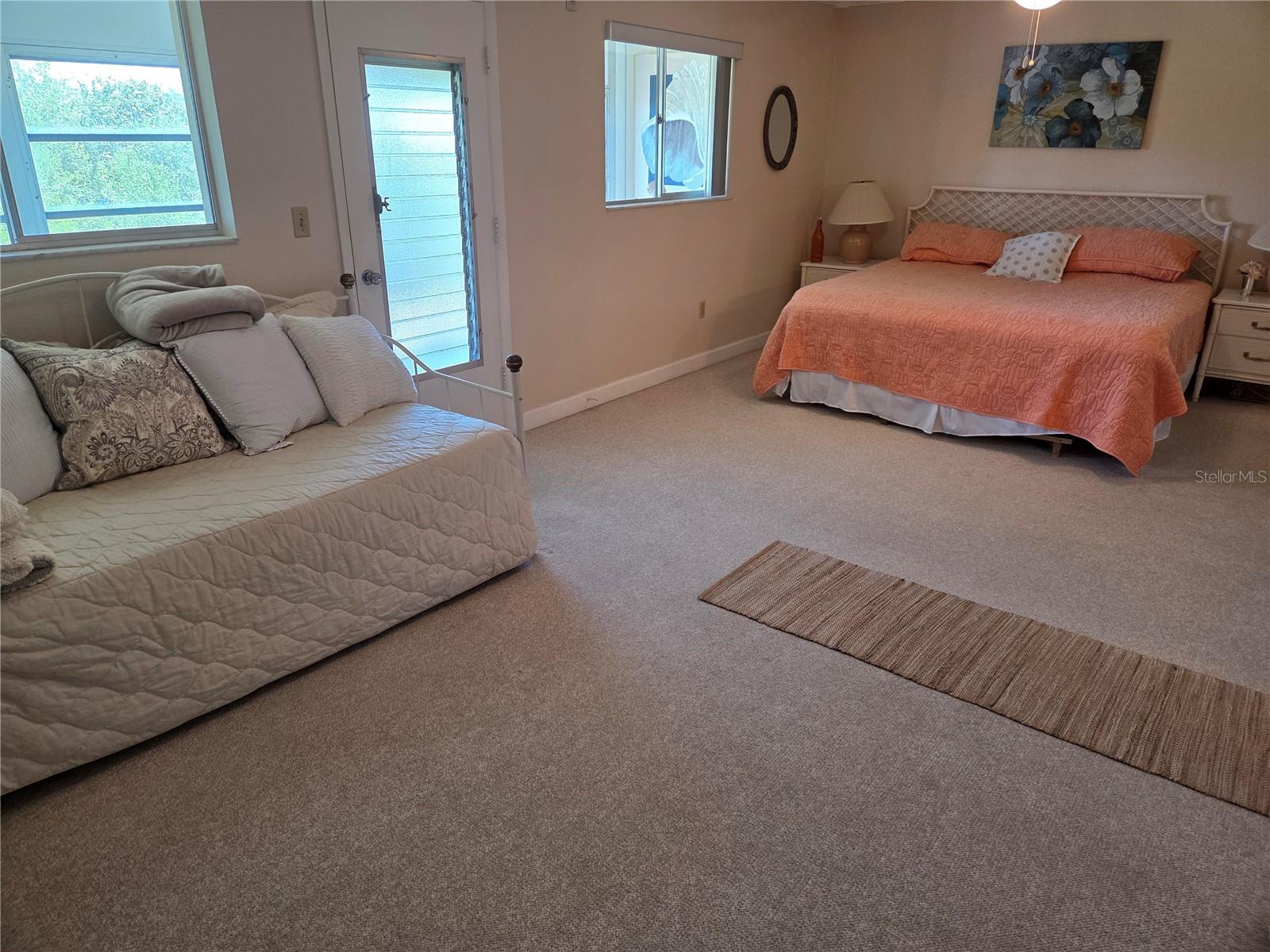 Large Bedroom with Pedestrian Door Opening Onto the Lani/Florida Room