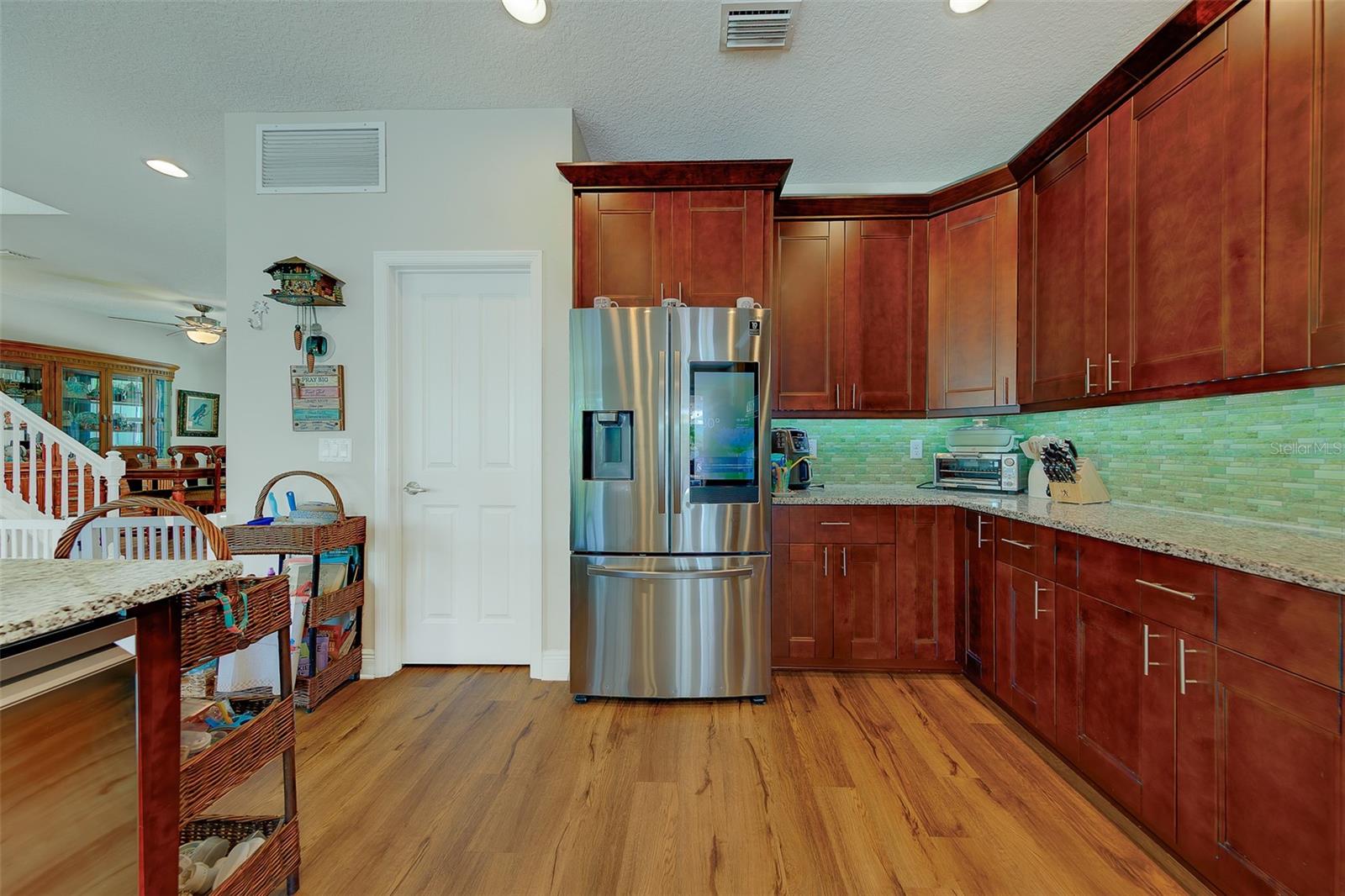 Plenty of cabinetry and stainless steel appliances