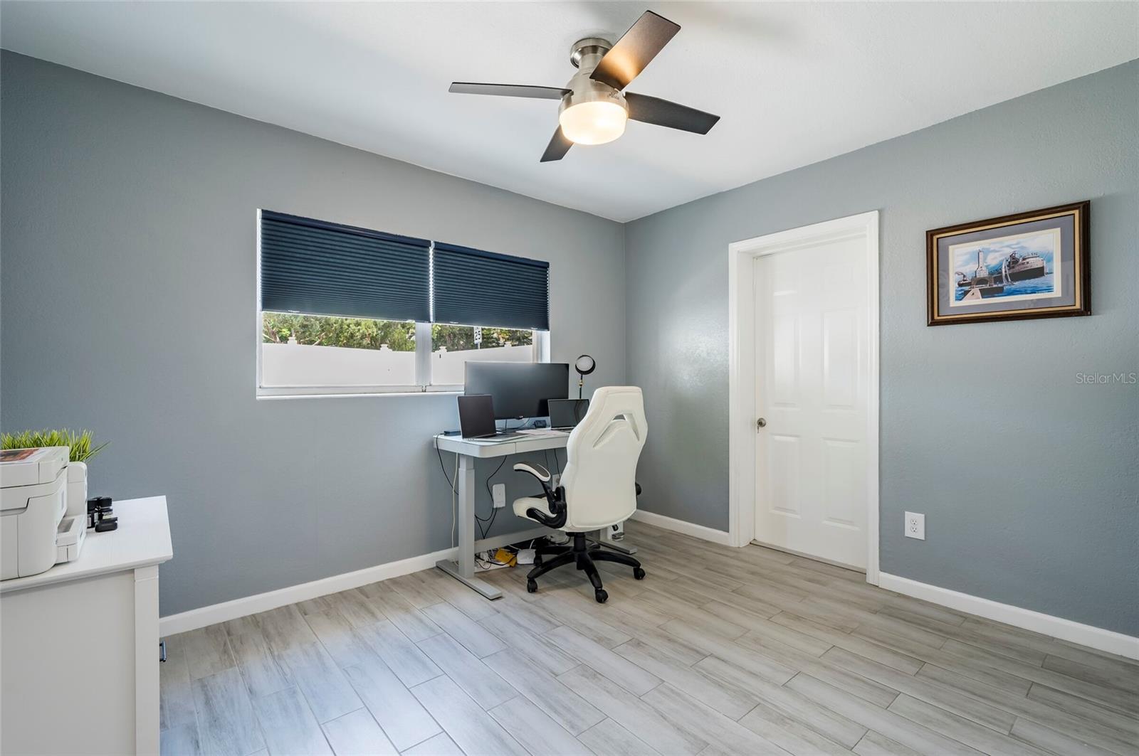 3rd bedroom/office with door to the backyard