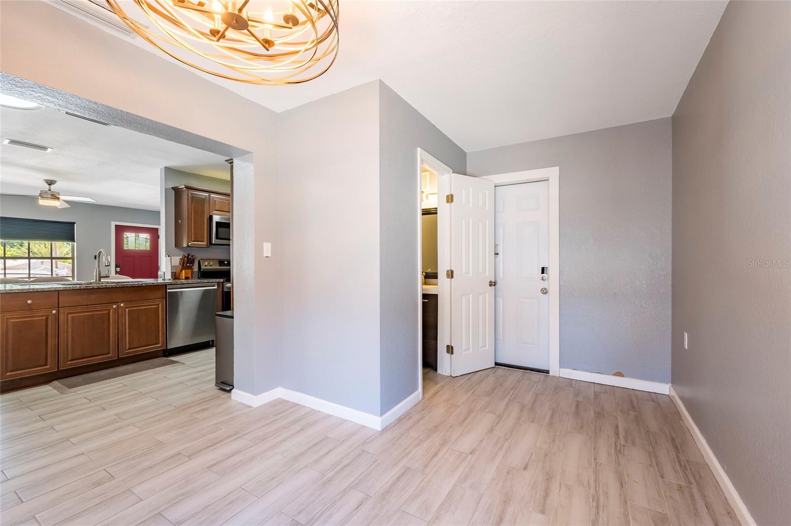 1/2 bath off of bonus space with door to back yard
