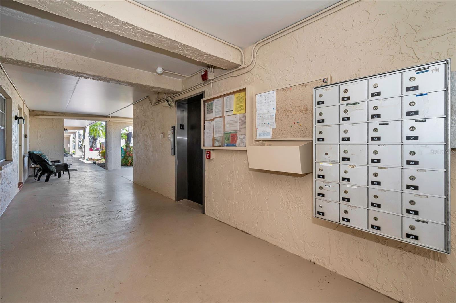 Mailboxes and Elevator, Located in the center of the Building