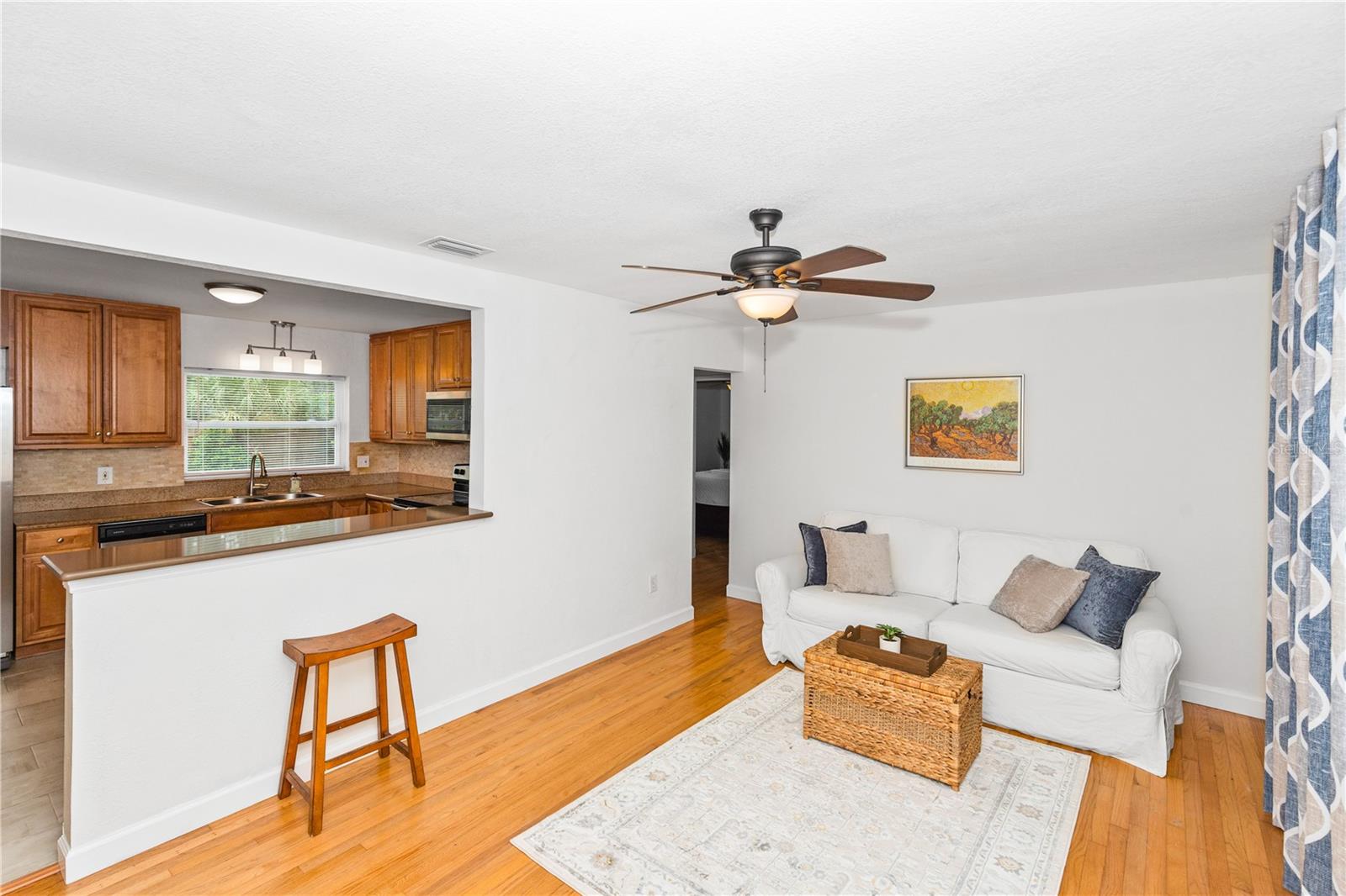 Flooring in living room is hard wood floors
