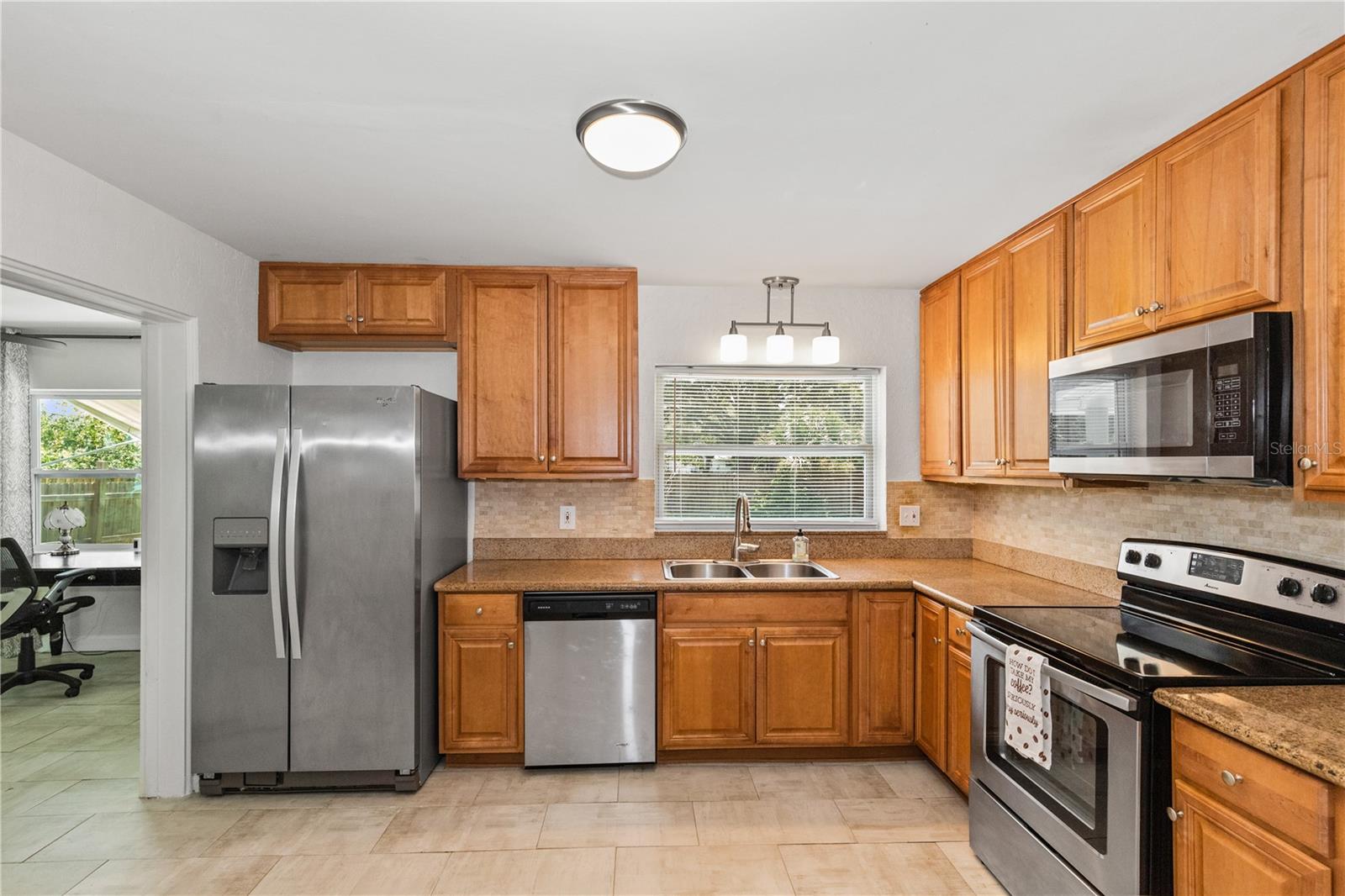 Open floor plan & view of the back yard