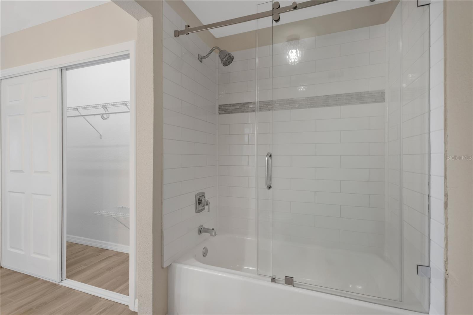 Primary bathroom with tub/shower combo
