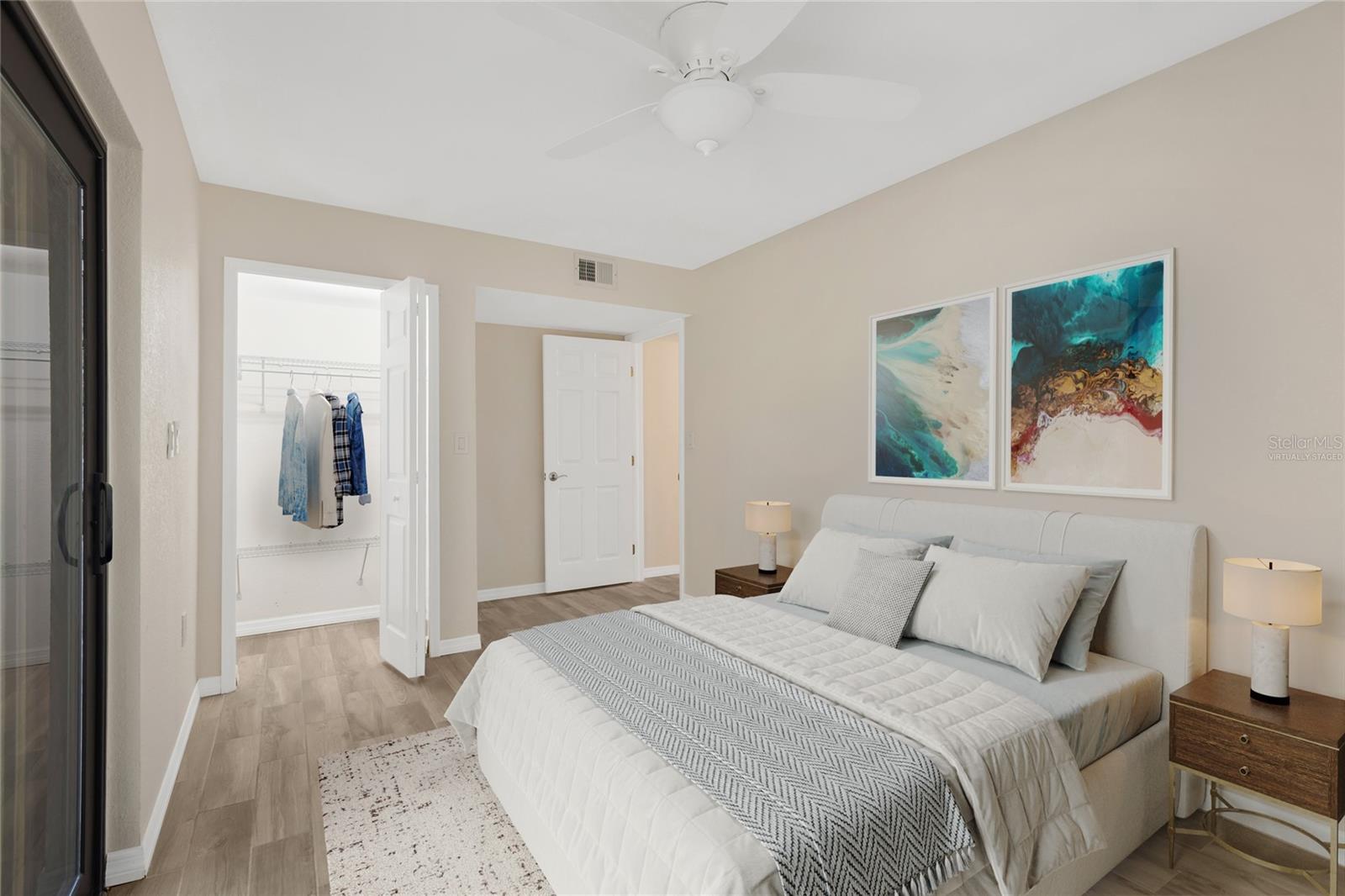 Guest bedroom featuring a private covered patio