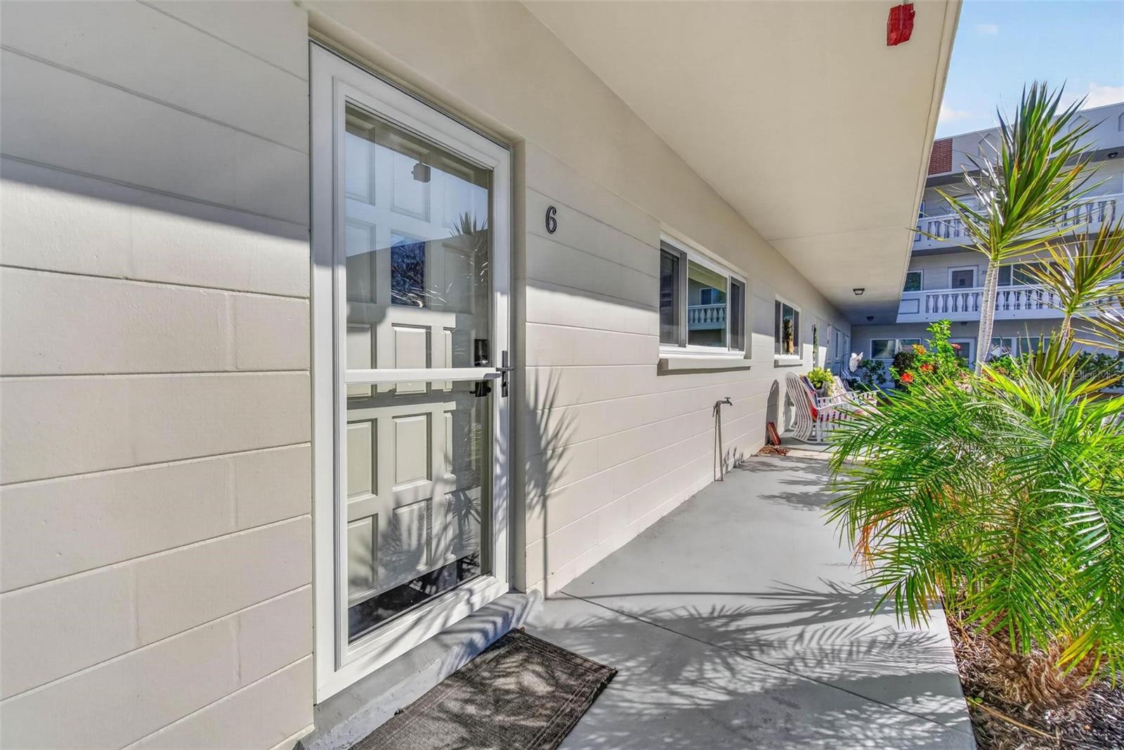 Unit 6 - Parking in front of Sun filled Front Porch
